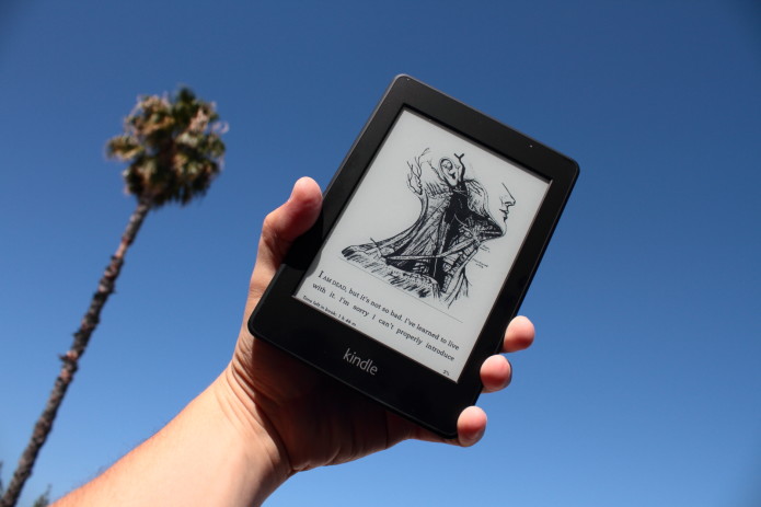 Amazon's new 7.6 mm Kindle Voyage stacked on top of the thicker and heavier Kindle Paperwhite.