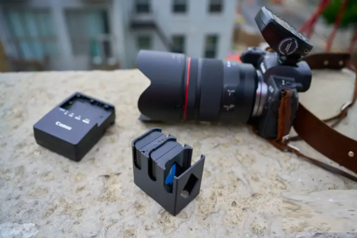 The Battery Mags Organize Camera Batteries in the Space of a Small Lens