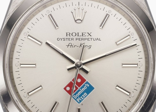 Why Is There a Domino’s Logo on This Rolex?