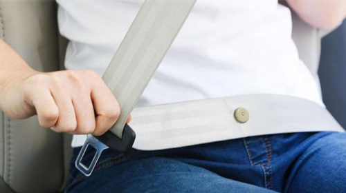 Here’s What That Little Button On A Car’s Seat Belt Is For