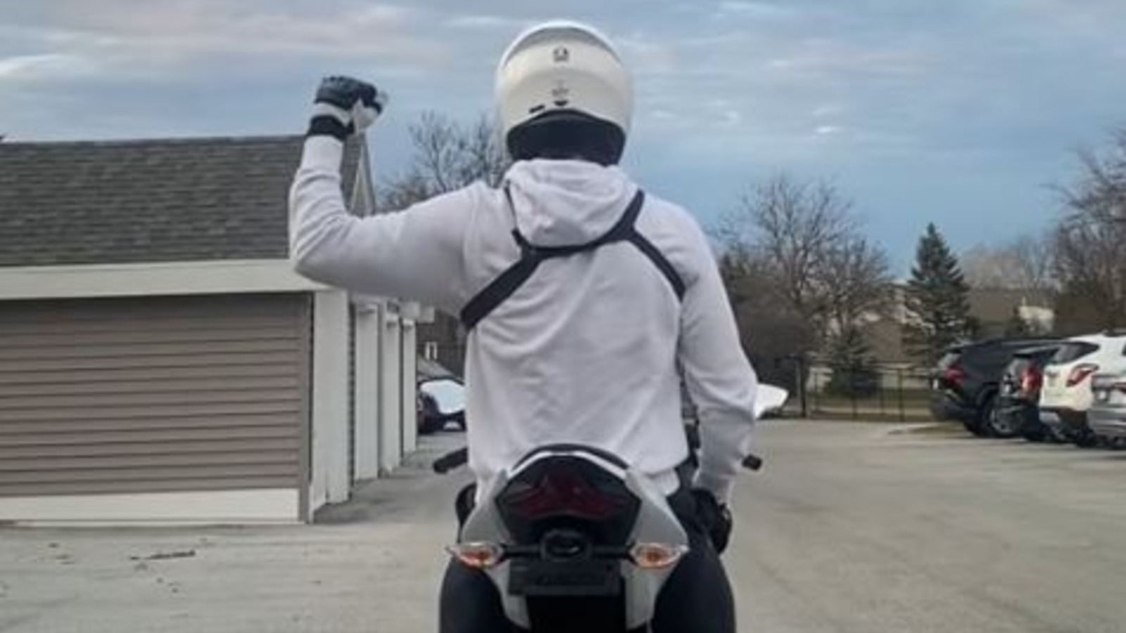 What Does It Mean When A Biker Raises Their Left Fist At 90-Degrees?