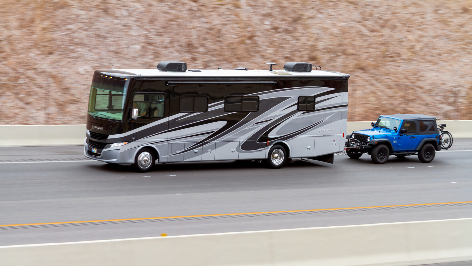 What To Know (And What You Need) Before Flat Towing Your Jeep