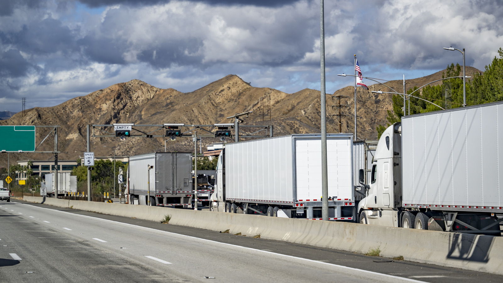 How Are Semi Trucks Weighed On The Road? The Tech Behind Weigh Stations Explained