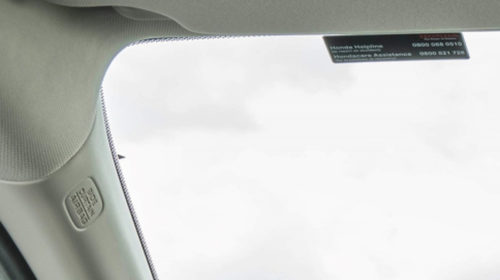 Here’s What Those Little Triangles On Your Honda Windshield Are For