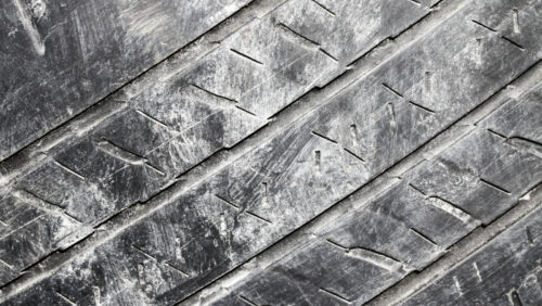 What Causes The White Powdery Residue On New Car Parts?