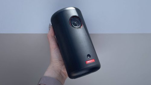 I chose this portable projector over a TV for my bedroom, and I love it – here are 3 reasons why, but 1 reason it might not be for you
