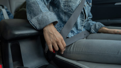 What Is That Little Button On Your Car’s Seat Belts For?