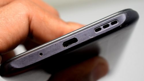 Here’s Why Your Phone Has A Little Hole Next To The Charging Port