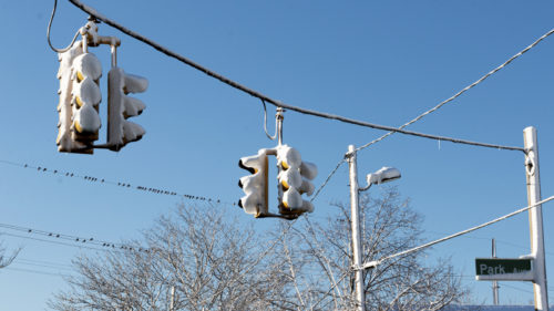 What Those Little Scoops On Top Of Traffic Lights Are For