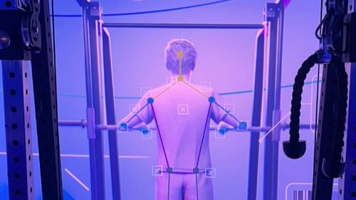 ‘This just knows so much more than a human ever could’: Meet CoachCube, the intelligent AI personal trainer that lives inside a Tron-style box room