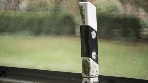 What Are Those Orange Poles With Reflective Stripes That Line The Road For?