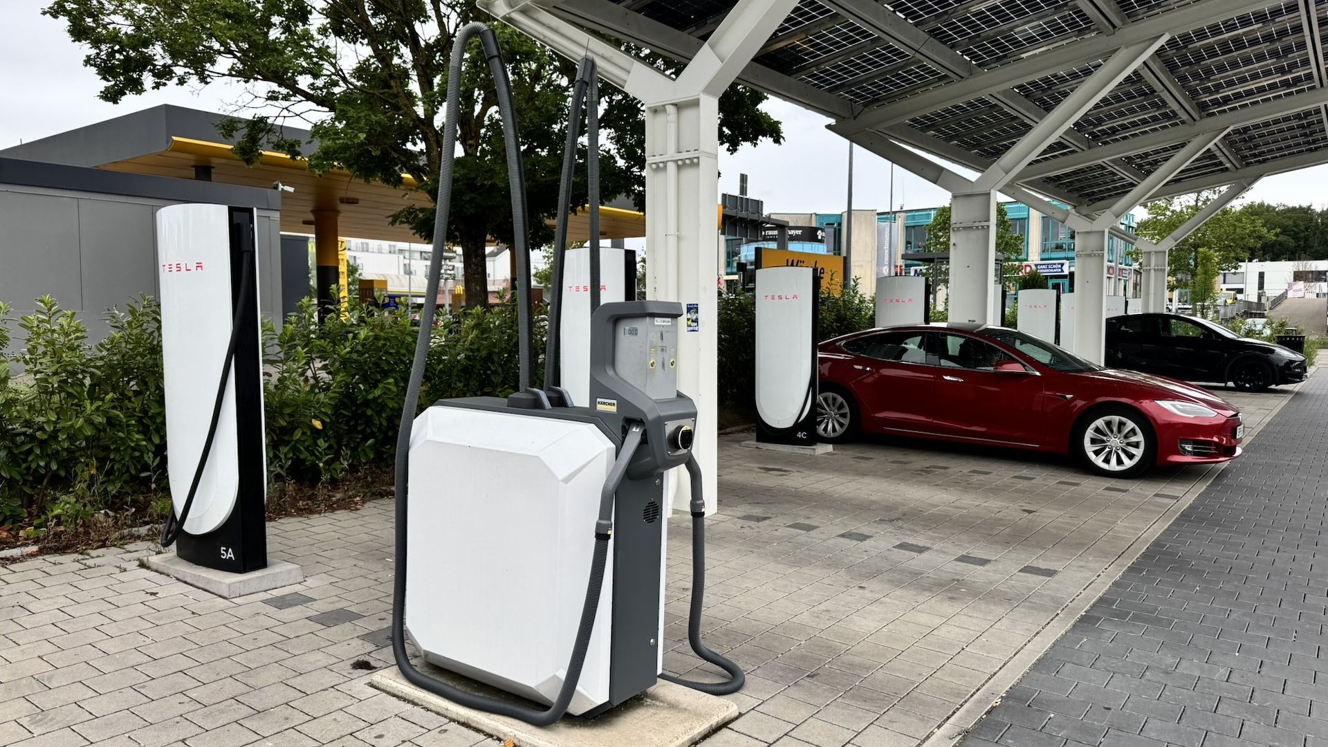 Tesla sucks! Handy vacuum cleaners have been spotted at some European Tesla Supercharger stalls