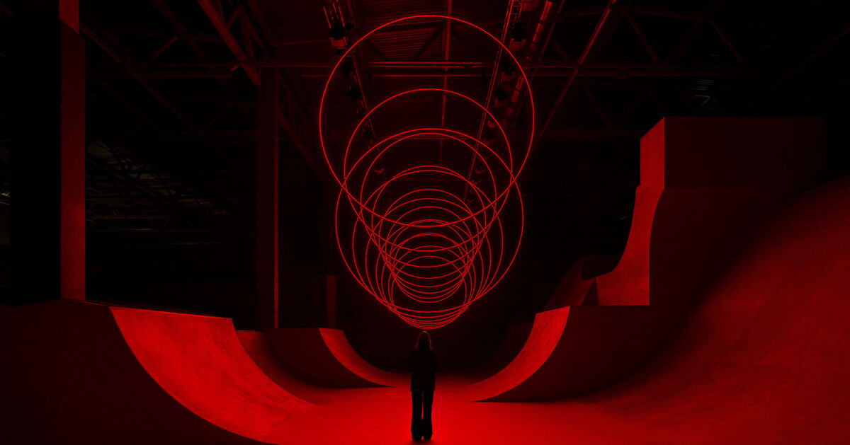 floating rings of light redraw space in SpY’s kinetic spatial installation