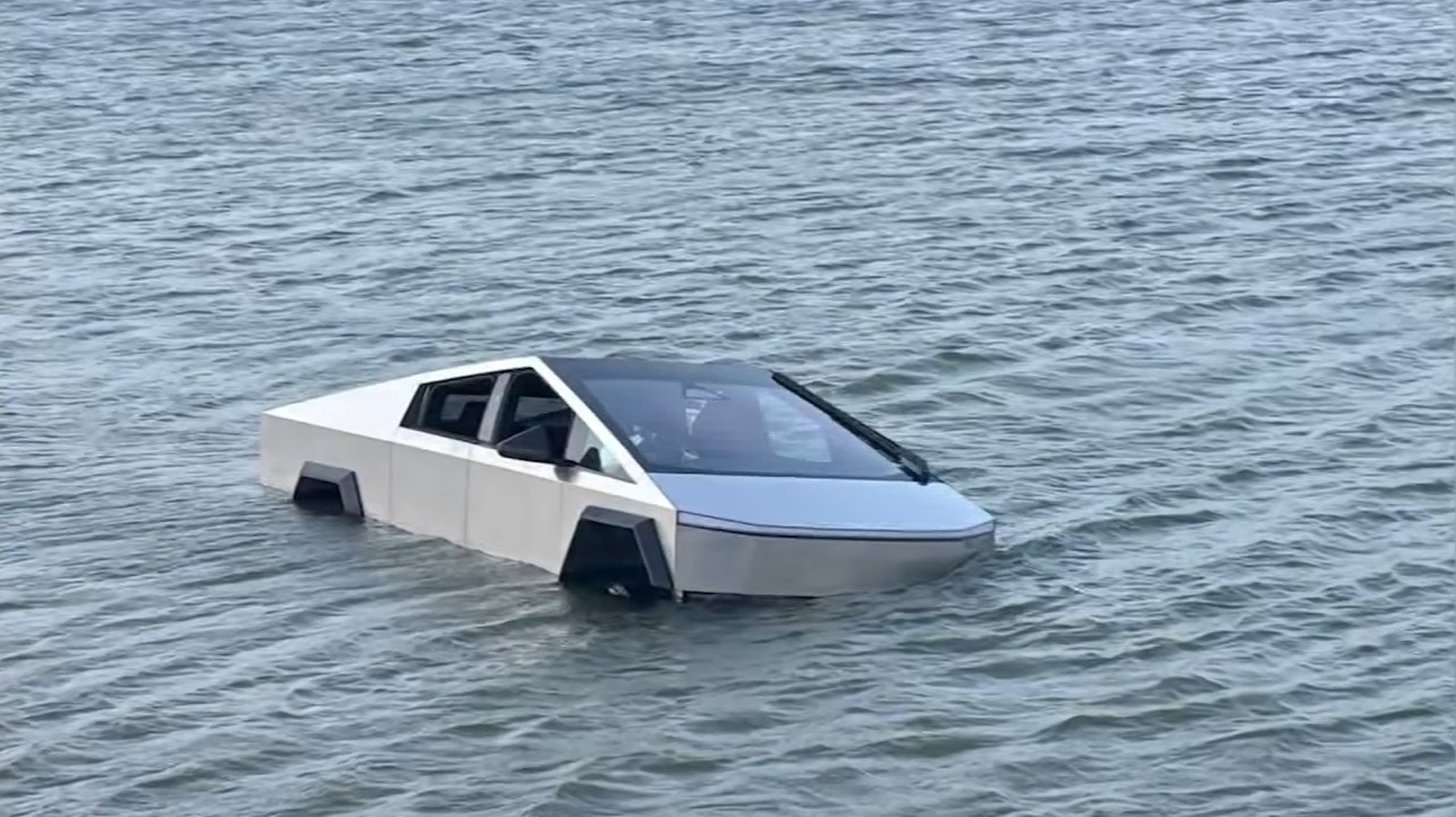Cybertruck Driver’s ‘Wade Mode’ Test Gets Him Stuck In A Lake – And In Jail
