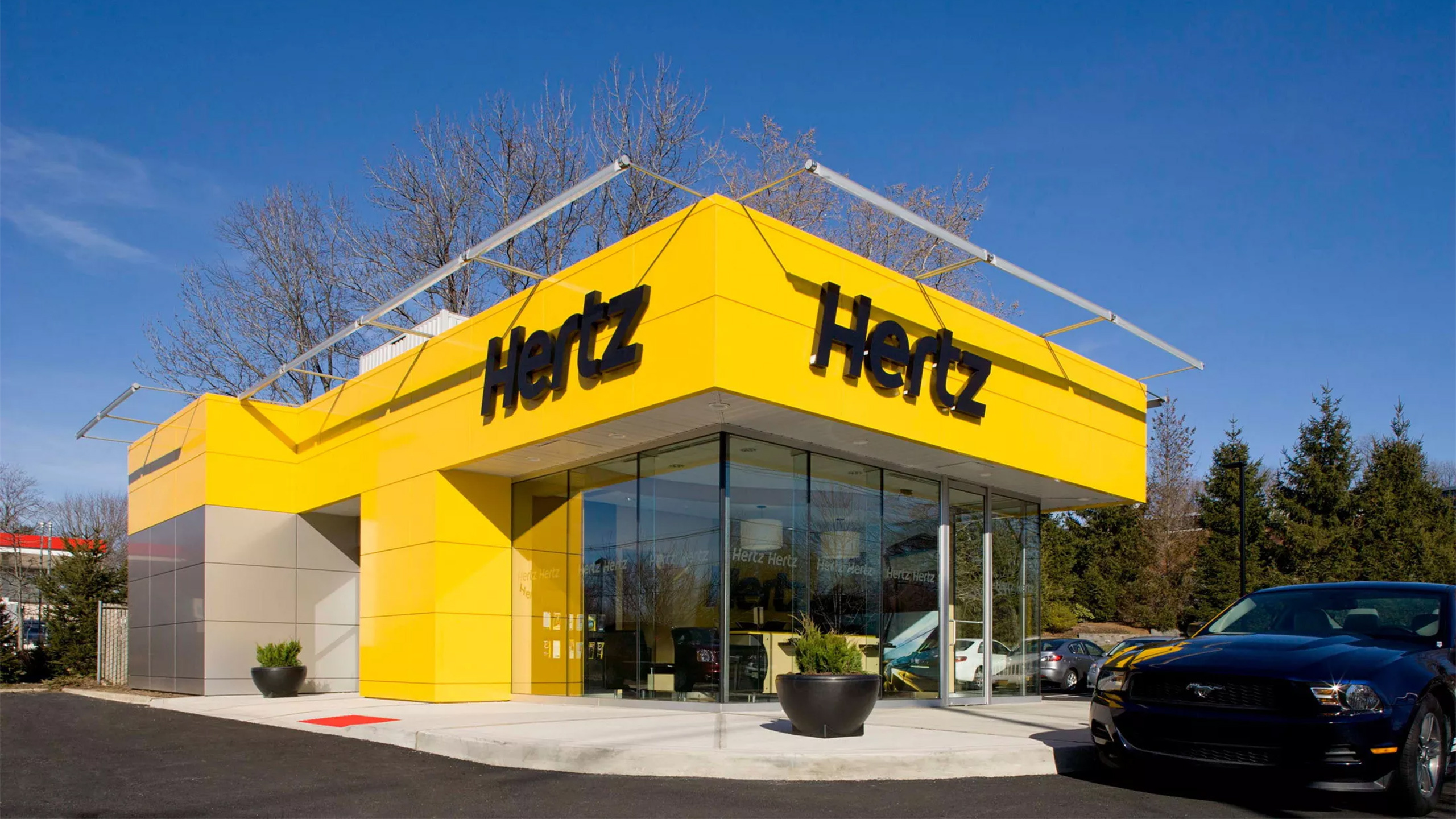 The Rental Giant That Dumped 30,000 EVs Is Now Betting On Self-Driving EVs | Carscoops