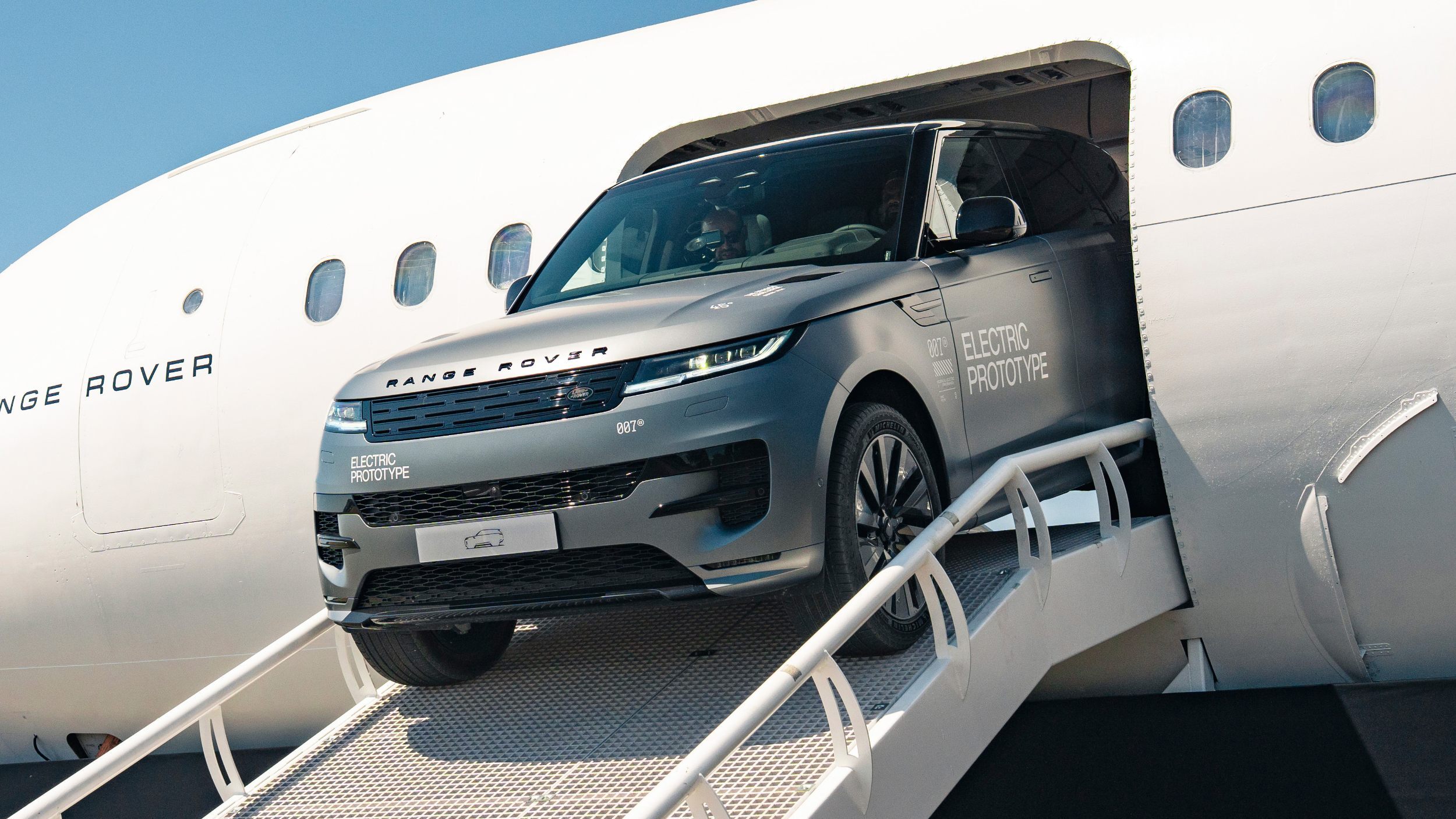 Range Rover Shoves New EV Sport Out Of An Airplane, But V8 Fans Can Relax | Carscoops