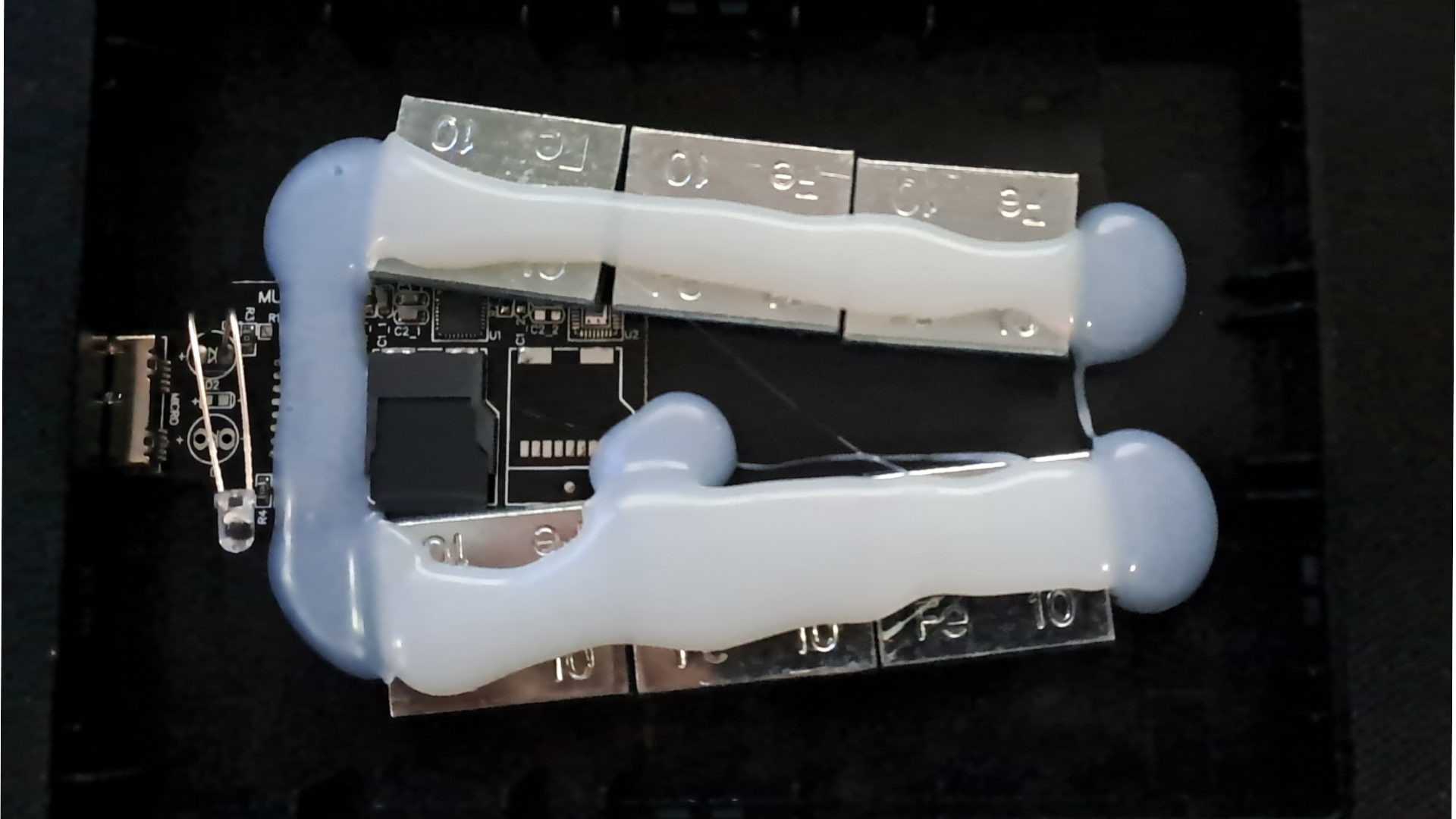 Redditor buys suspicious drives on eBay just to report the scamming sellers if they get a fake SSD or HDD — latest ’16TB’ find has weights and microSD card hot-glued inside the enclosure to make it feel legit