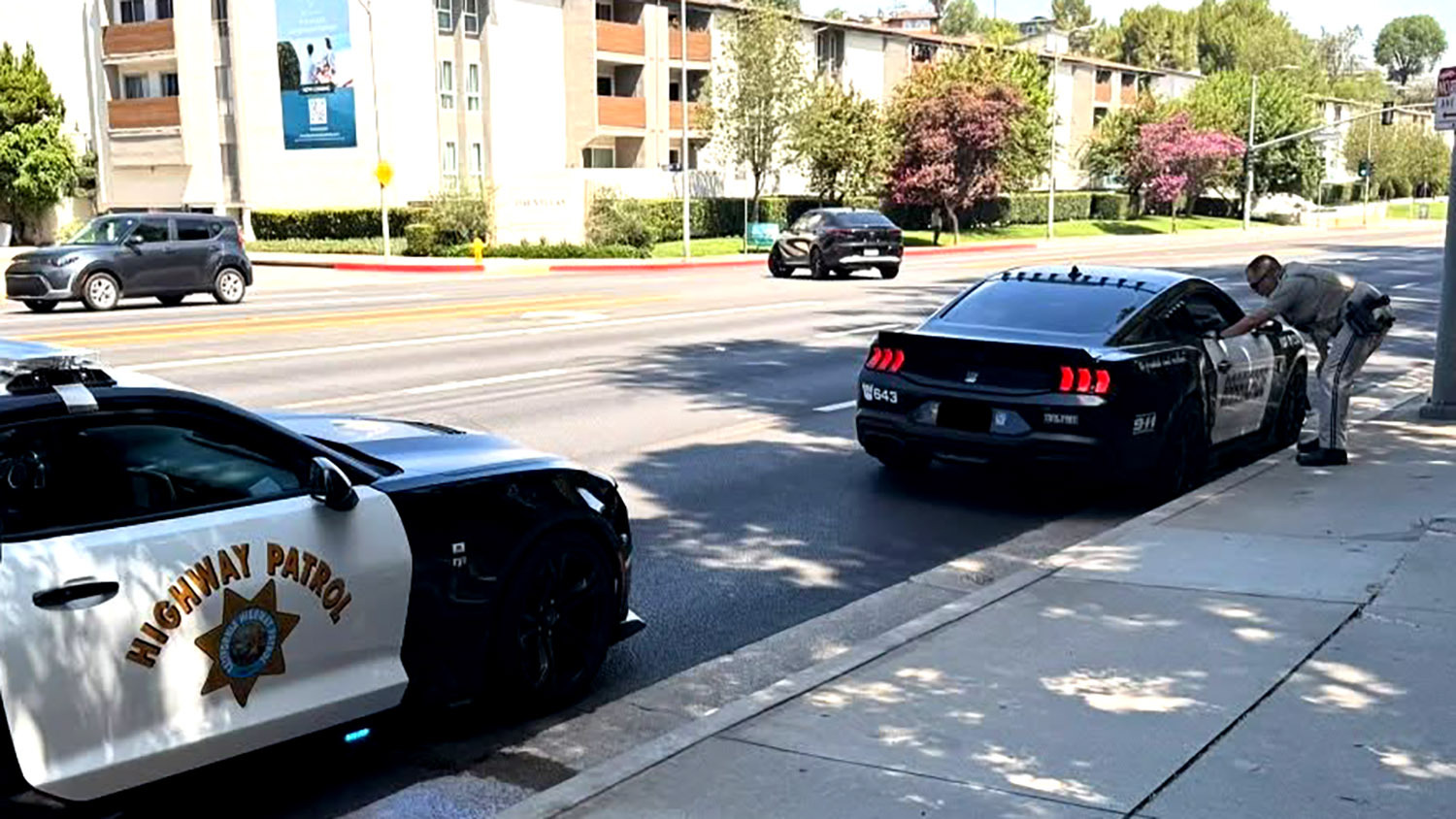 Fake Transformers Mustang Cop Car Ticketed By Real Camaro Cop Car | Carscoops