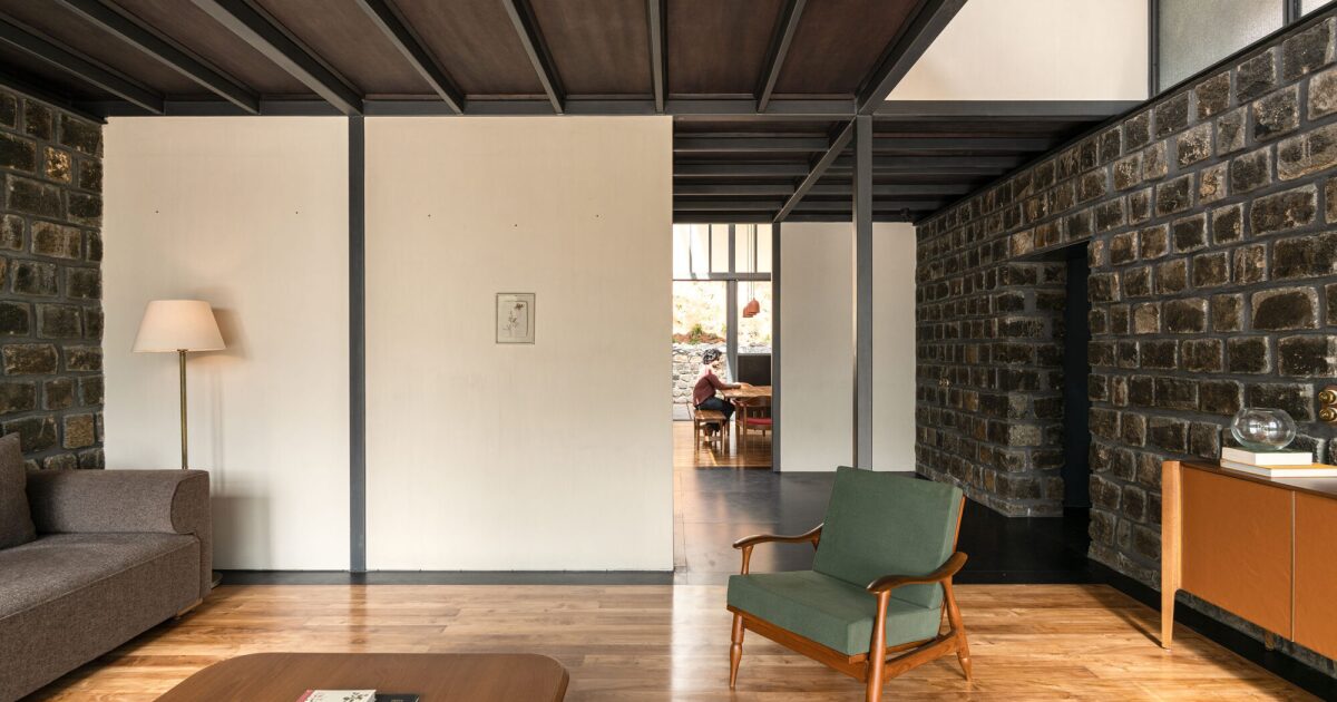 Beautifully rustic mountain house rises from its colonial-era grave