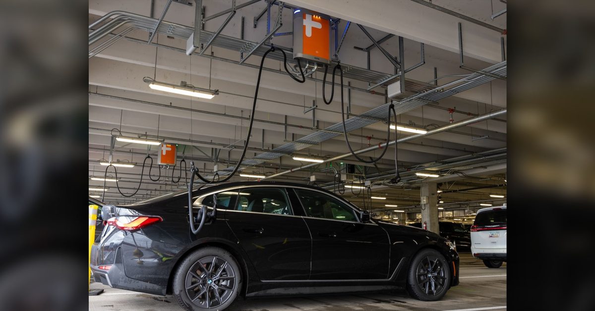 Portland airport can charge 20 rental EVs at once – from overhead