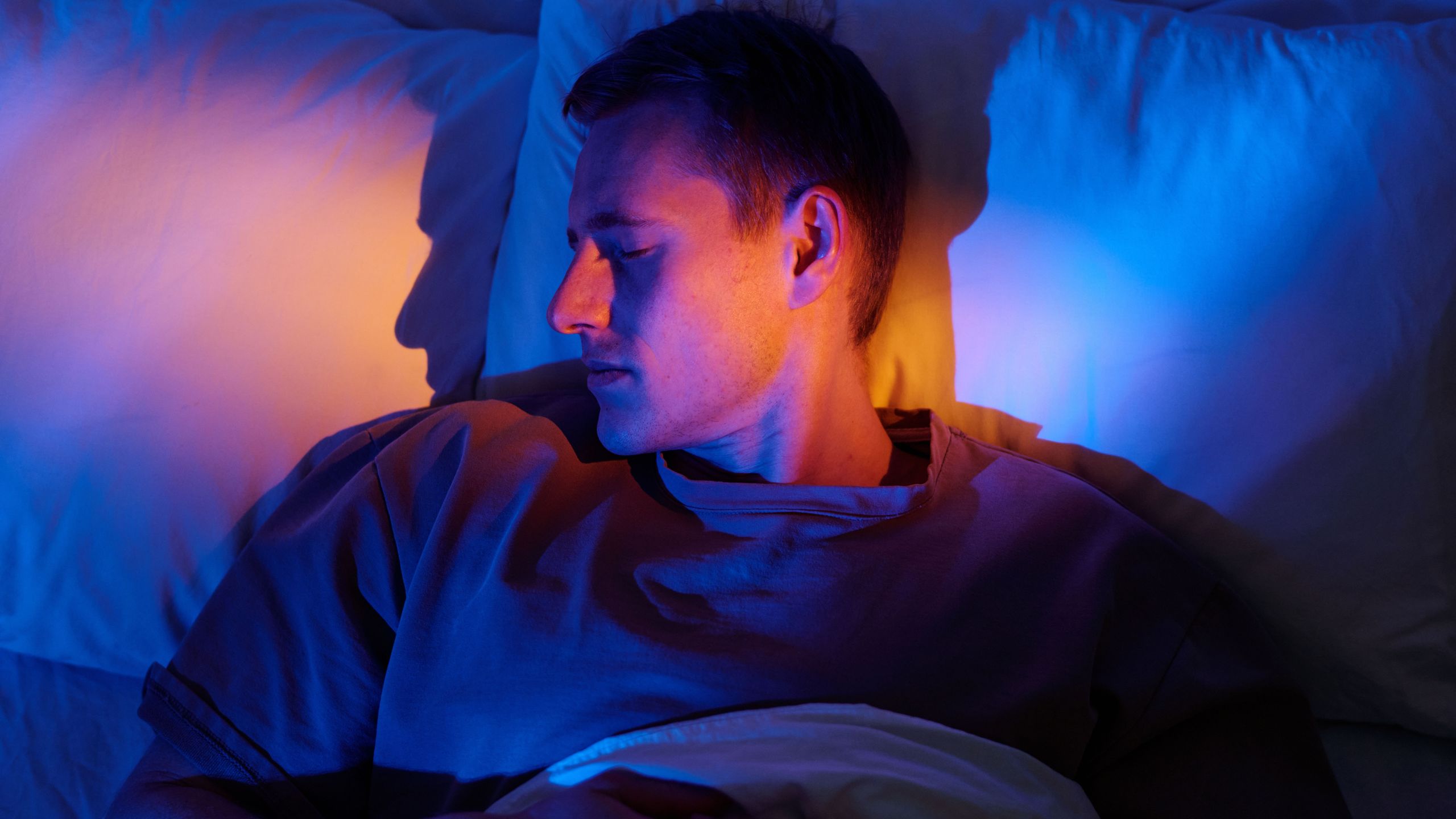 Researchers warn of a hidden sleep crisis among workers over 50, so I asked ChatGPT to help quiet my mind before bed — and it actually worked