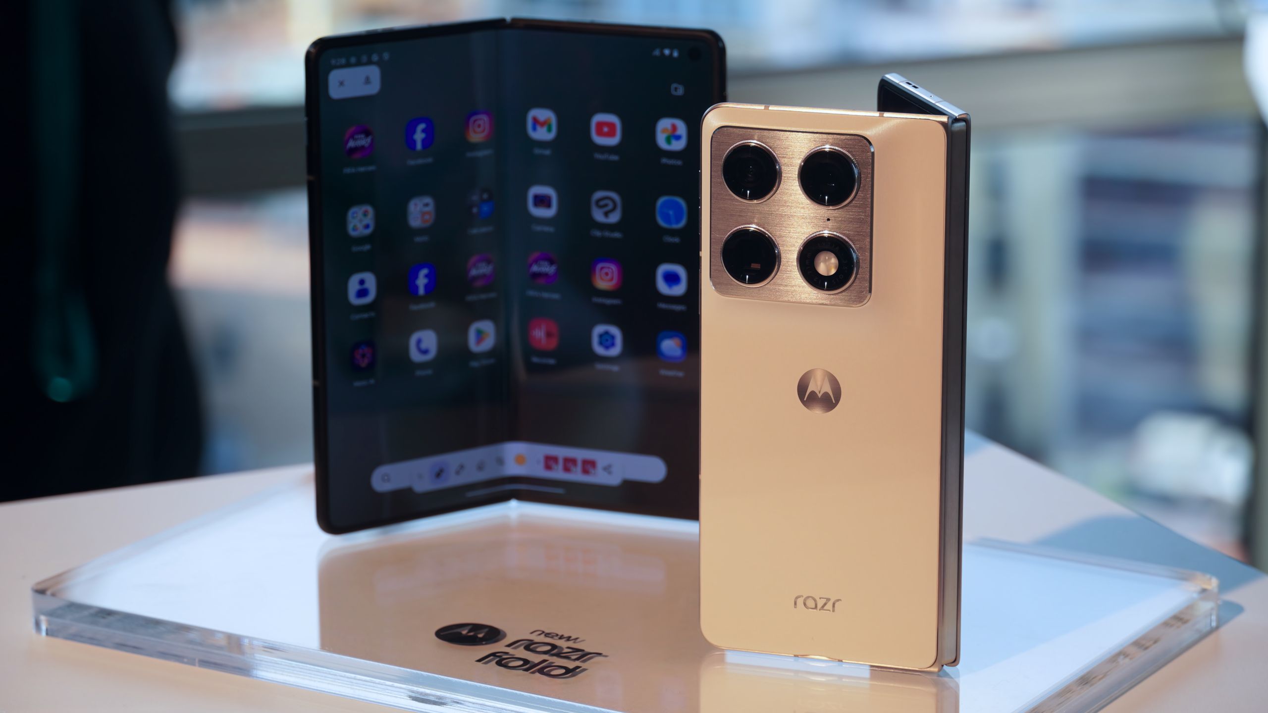 Motorola says it’s got a wide foldable, too: teases short Razr after Apple