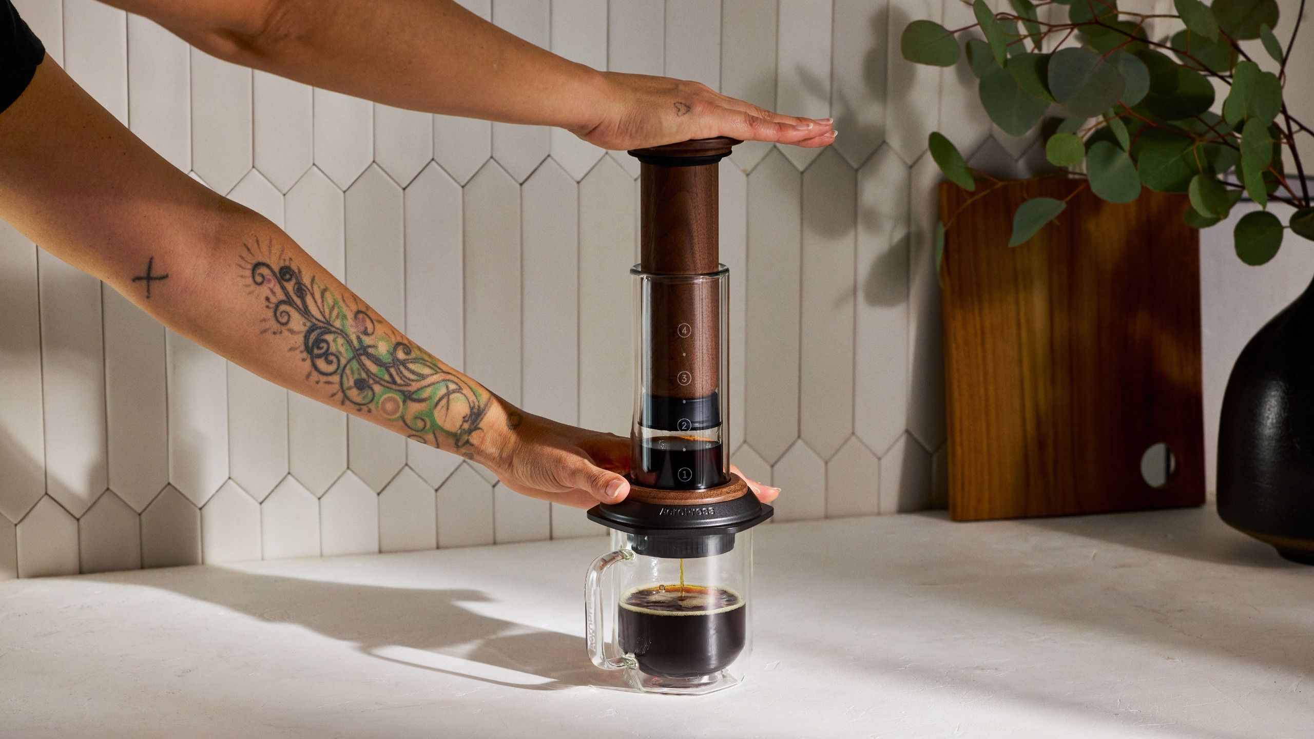 The AeroPress coffee maker just got a luxury walnut and glass upgrade that would be a perfect gift for coffee lovers — and I need it in my kitchen immediately