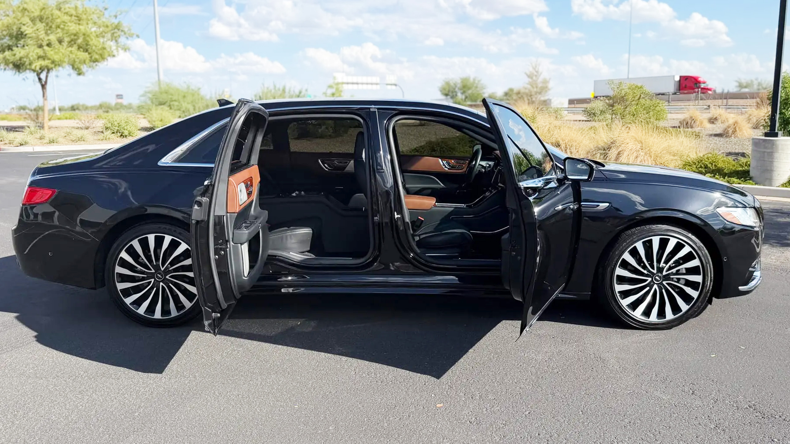 You Don’t Need A Rolls-Royce To Have A Luxury Sedan With Coach Doors | Carscoops