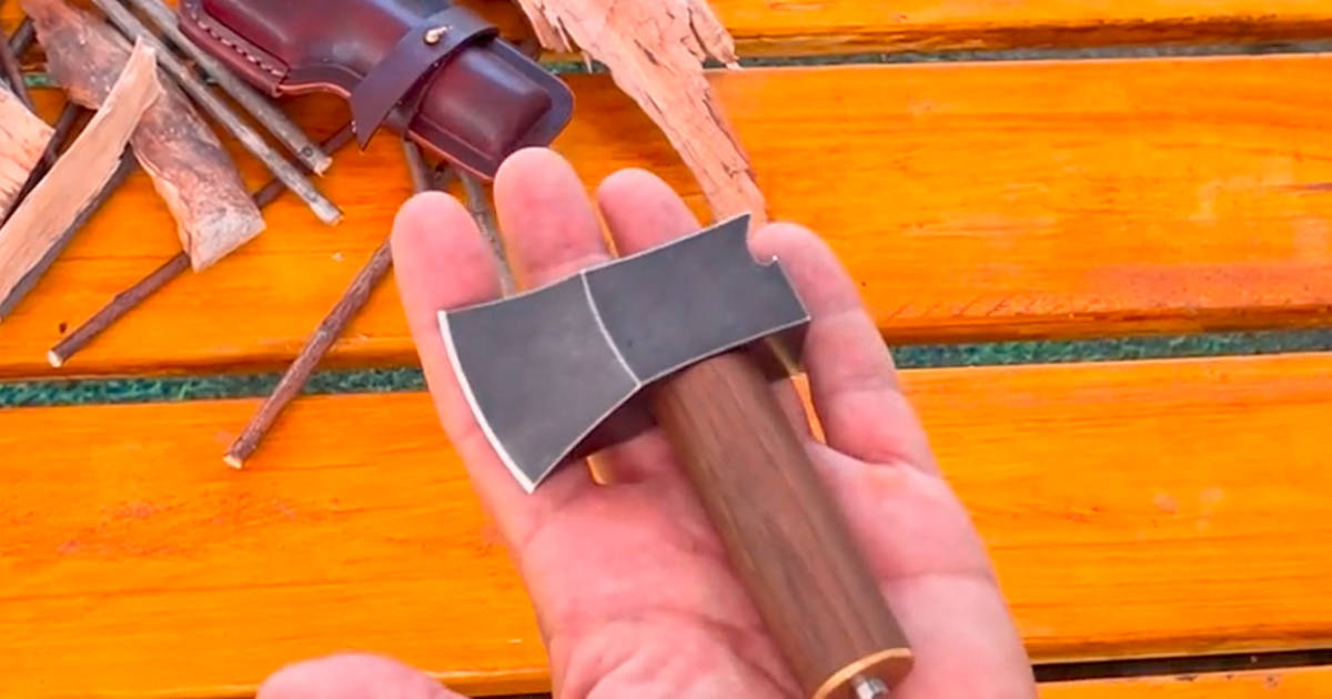 Palm-sized pocket axe brings its own fire starter to the pit
