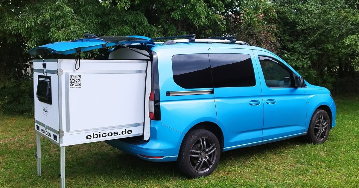 Flatpack camping pod explodes a tiny van into a big camper van