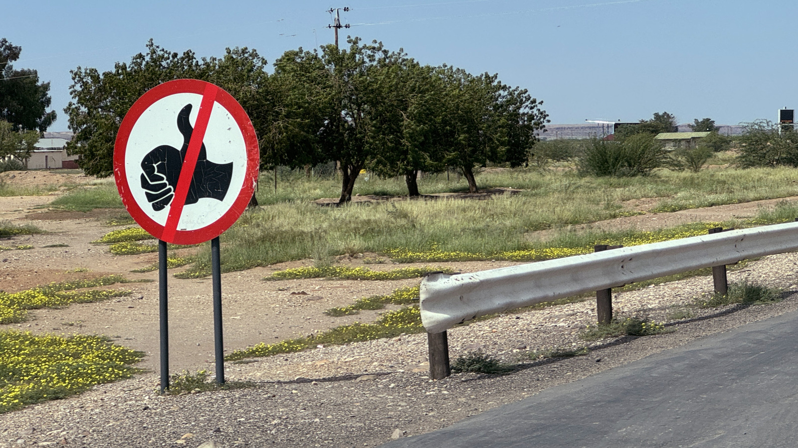 What Does It Mean When You See A Road Sign With A Thumbs Up On It? – SlashGear
