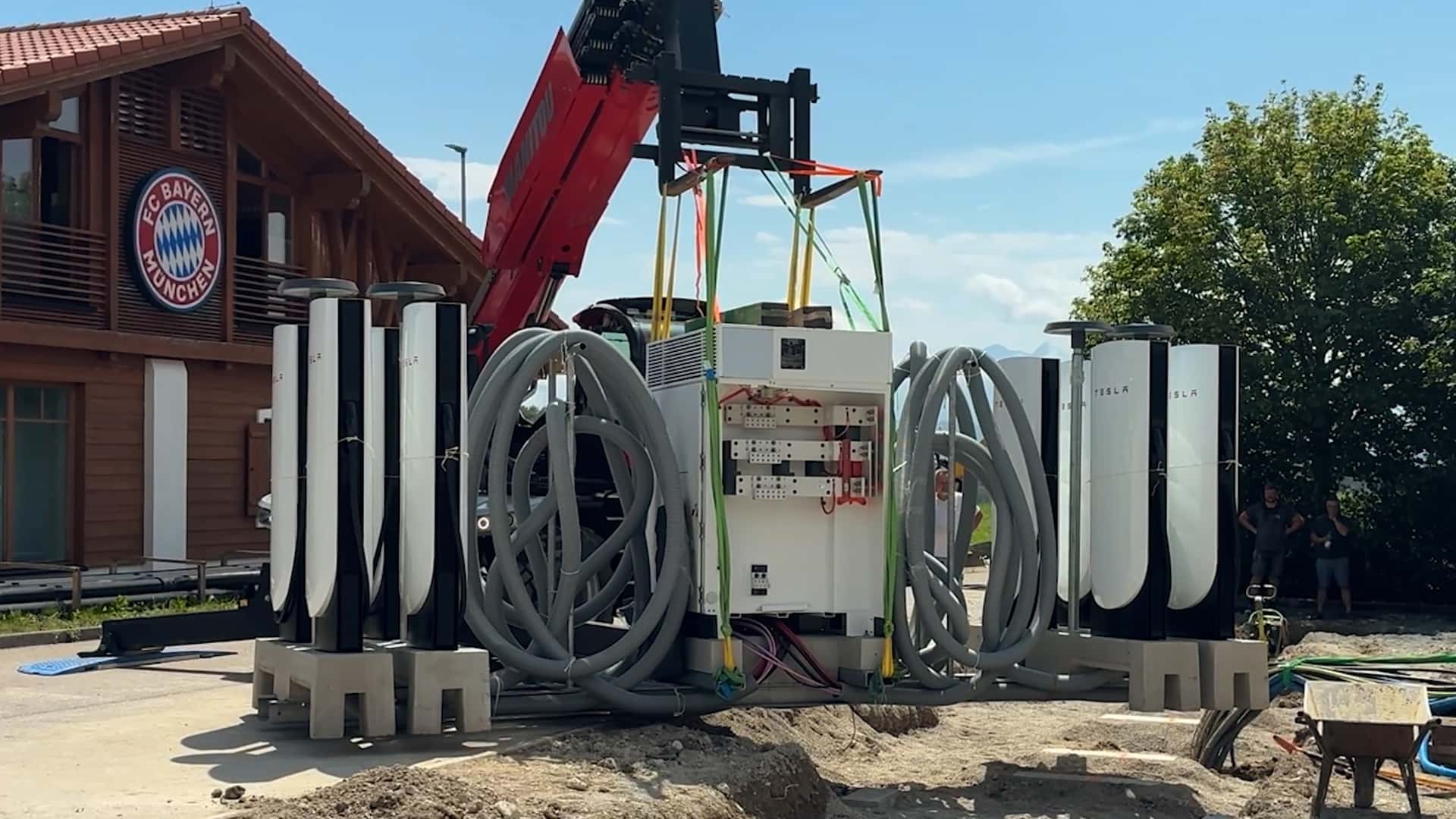 Tesla’s New ‘Accordion’ Superchargers Cut Costs And Installation Time