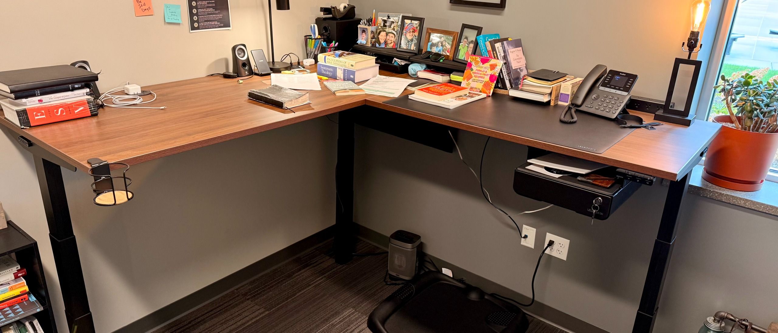 Uplift’s L-shaped standing desk is beautifully built for a workstation setup