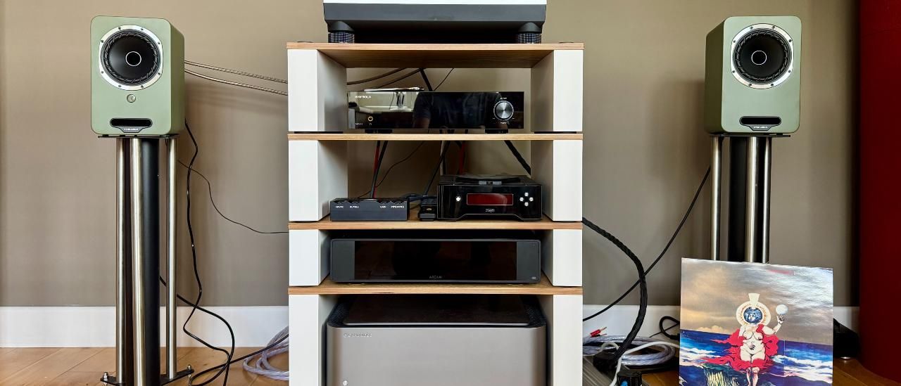 I tried to ignore this compact stereo speaker system’s background hiss and focus on the spacious and punchy sound, but I couldn’t forgive the low-rent control options