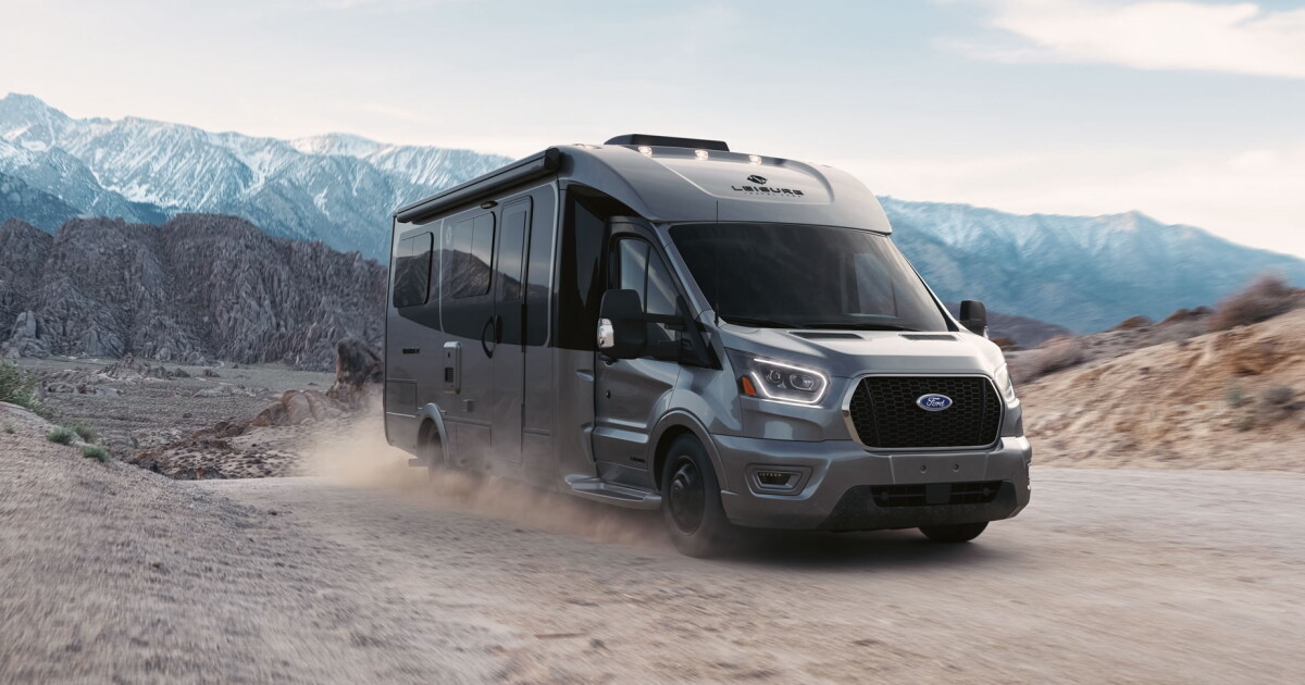 Ford minibus camper lives XL via pop-and-drop Murphy bed theater