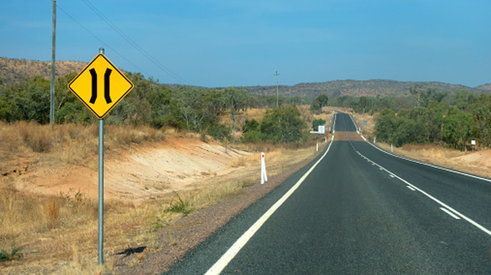 What Does The Hourglass Shape On A Road Sign Mean? – SlashGear