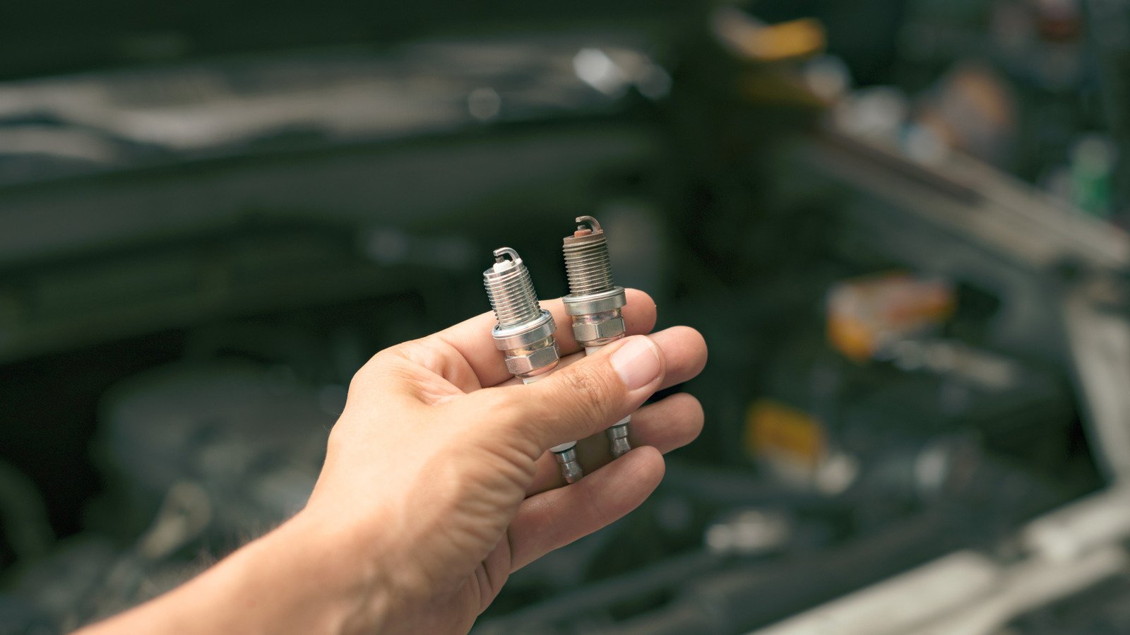 What Do Brown Deposits On A Spark Plug Mean? – SlashGear