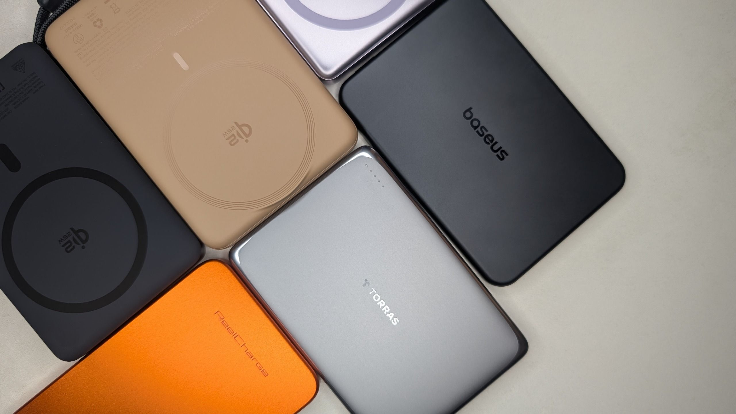 I tested the best slim Qi2 power banks released in 2026: Baseus, TORRAS, INIU, ReelCharge