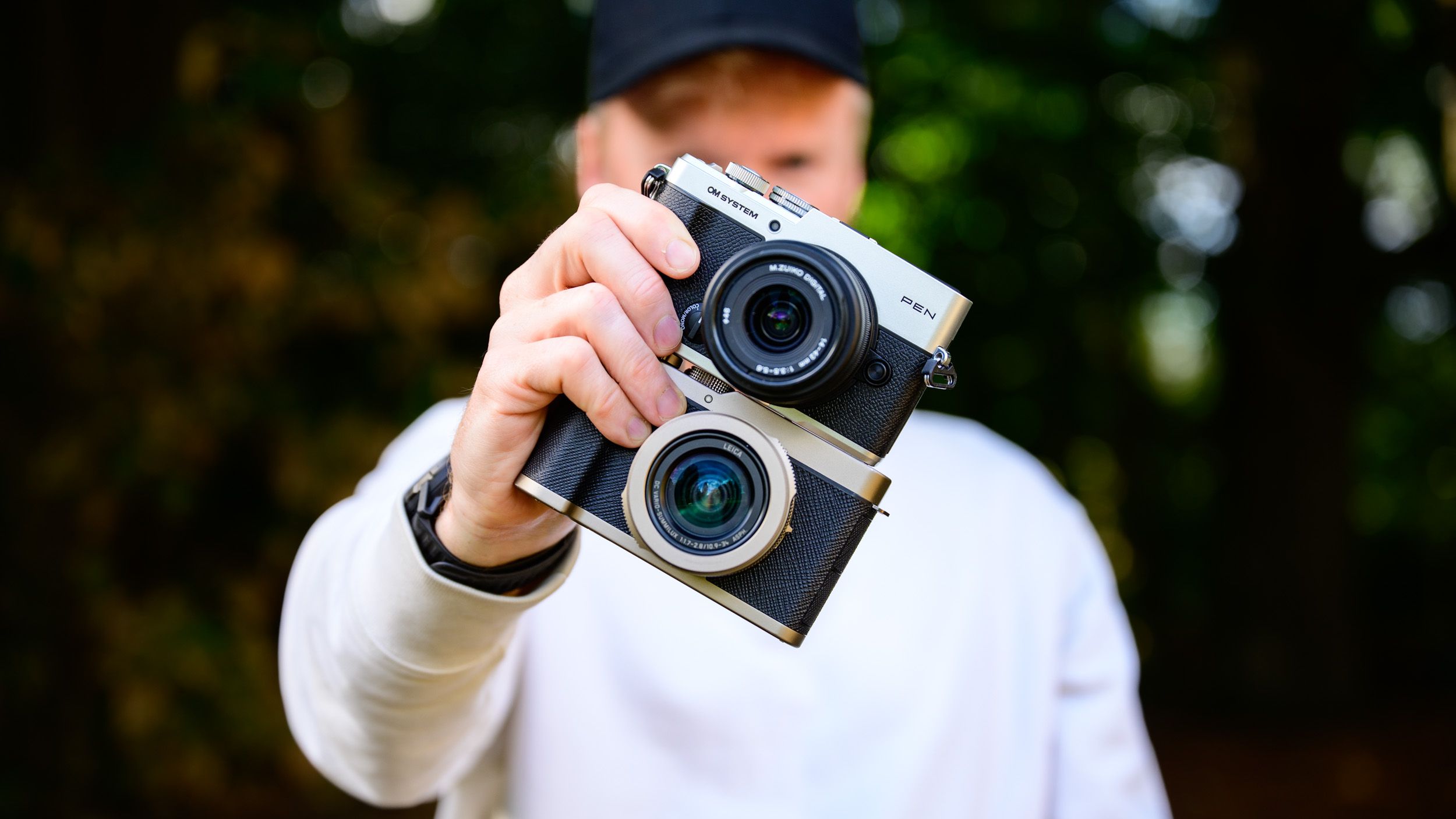 I took the OM System PEN and Lumix L10 rangefinder cameras traveling — and I was surprised by which one was my favorite